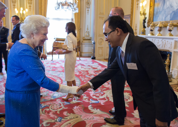 Co-founder Mamun with Queen Elizabeth II